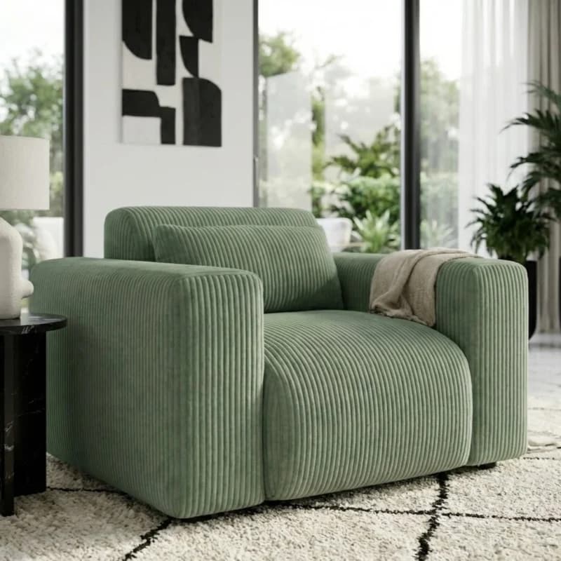 Lifestyle image showing the Tuscany Sea Green fabric (Big Billy Misty Cove) on a Candy Armchair.