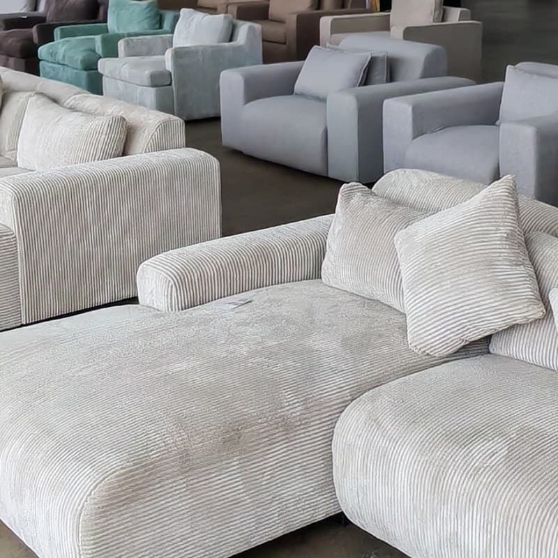 Showroom setting with Scooch sofas in various fabrics
