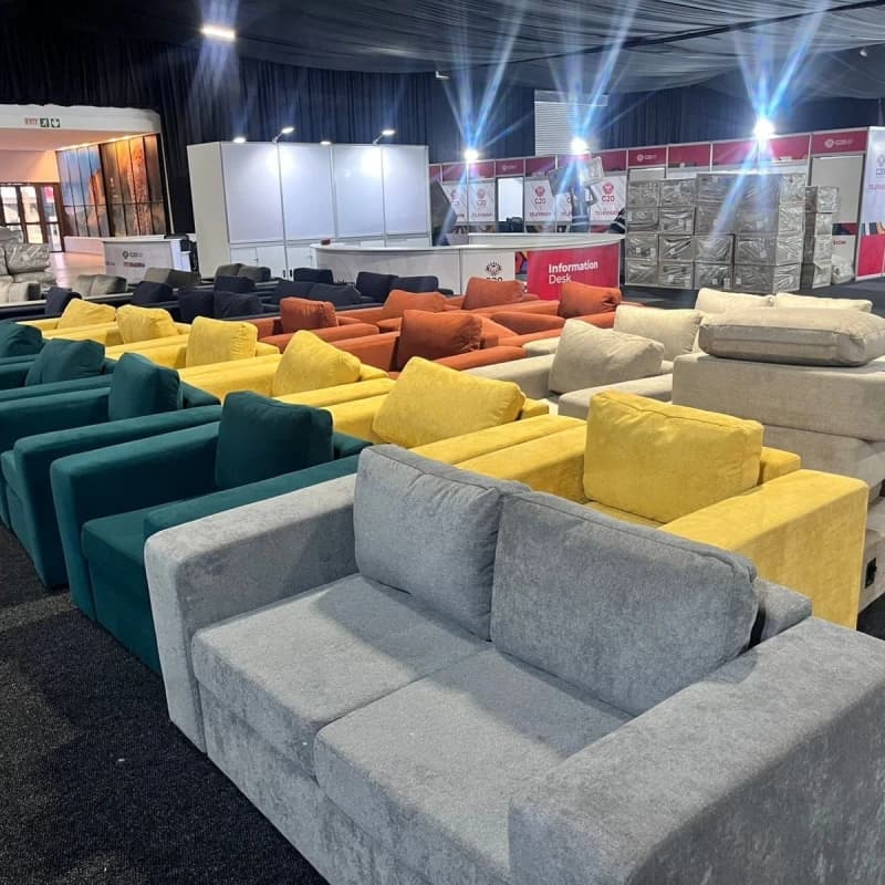 A view of the G20 summit conference room filled with Scooch sofas and armchairs in various coours.