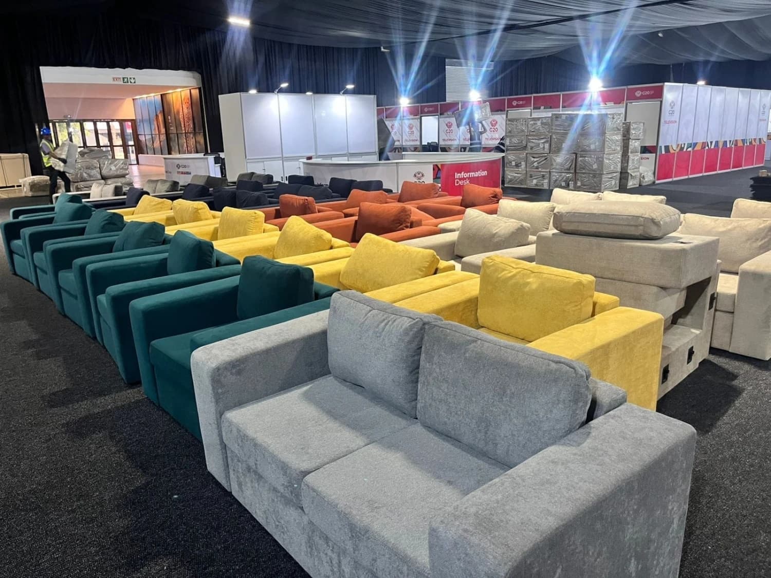 A view of the G20 summit conference room filled with Scooch sofas and armchairs in various coours.